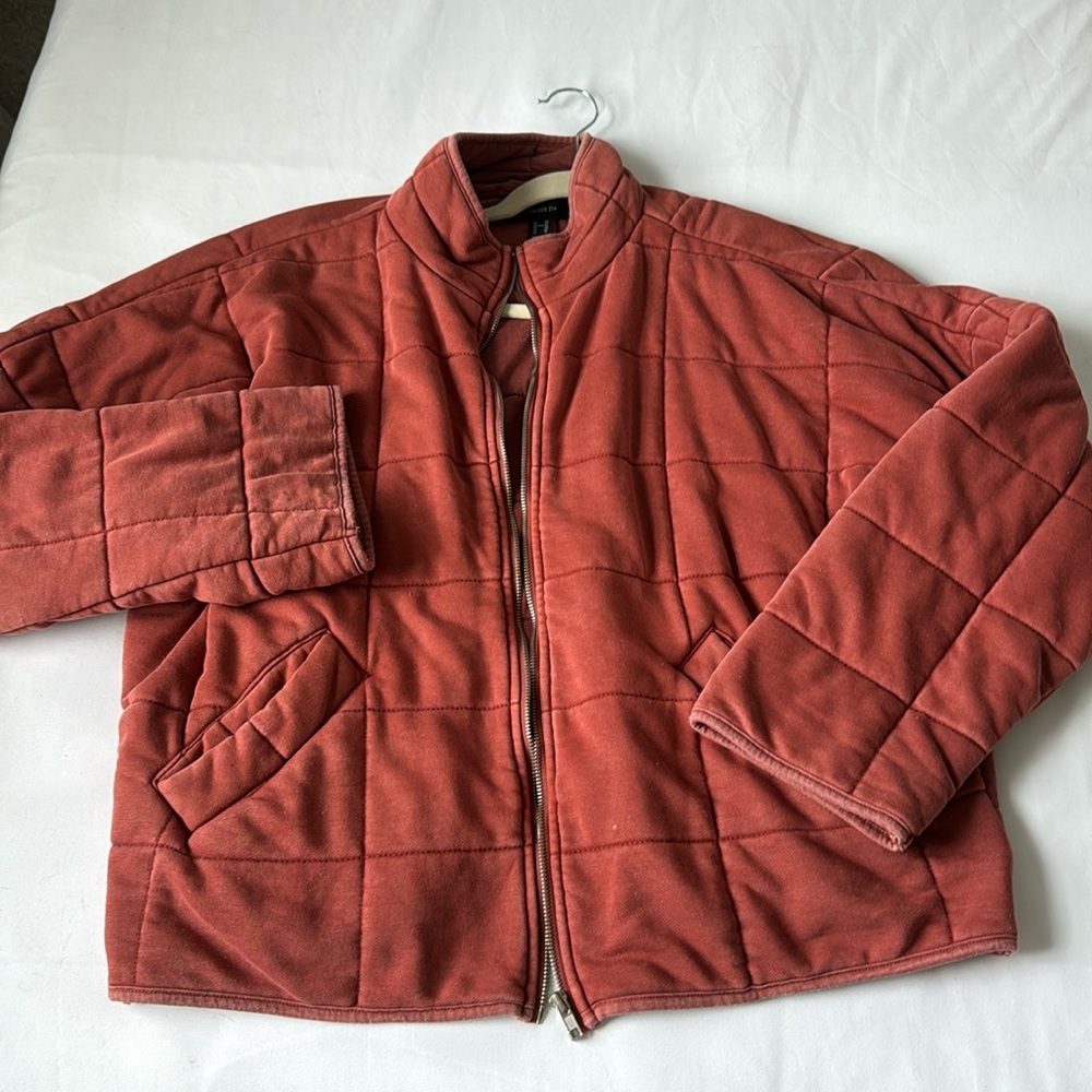 red quilted bomber.